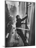 Window Cleaners Cleaning High Rise on Madison Avenue-Walter Sanders-Mounted Photographic Print