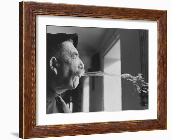 Wine Cellar Master and Taster Spitting Wine-Carlo Bavagnoli-Framed Photographic Print