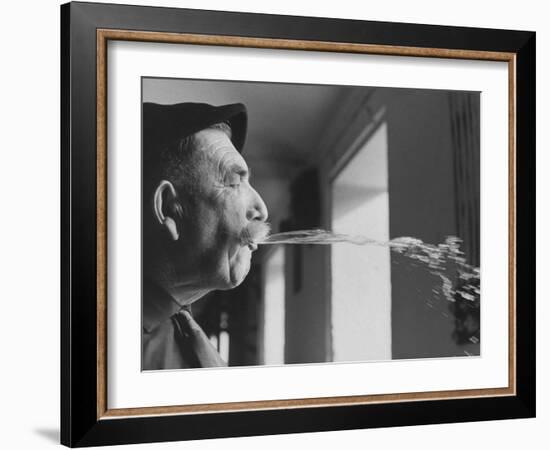 Wine Cellar Master and Taster Spitting Wine-Carlo Bavagnoli-Framed Photographic Print