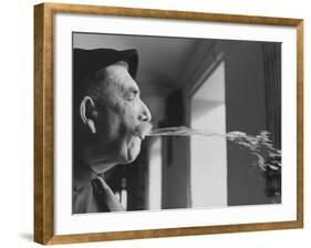 Wine Cellar Master and Taster Spitting Wine-Carlo Bavagnoli-Framed Photographic Print