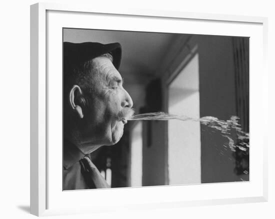 Wine Cellar Master and Taster Spitting Wine-Carlo Bavagnoli-Framed Photographic Print