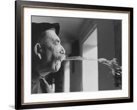 Wine Cellar Master and Taster Spitting Wine-Carlo Bavagnoli-Framed Photographic Print