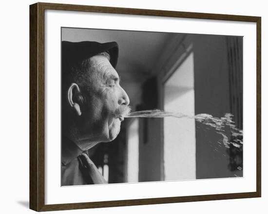 Wine Cellar Master and Taster Spitting Wine-Carlo Bavagnoli-Framed Photographic Print