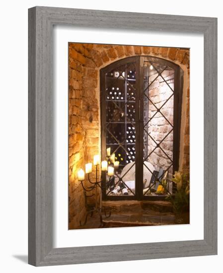 Wine Cellar with Bottles Behind Iron Bars, Stockholm, Sweden-Per Karlsson-Framed Photographic Print