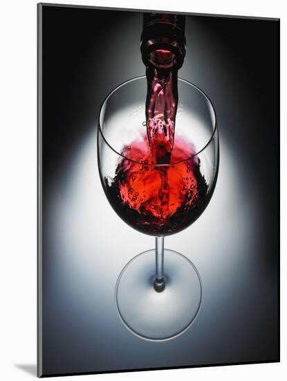 Wine poured in glass-Newmann-Mounted Photographic Print