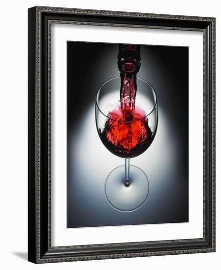 Wine poured in glass-Newmann-Framed Photographic Print