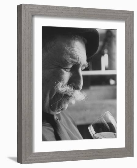 Wine Taster Sniffing Wine Before Tasting It-Carlo Bavagnoli-Framed Photographic Print