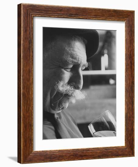 Wine Taster Sniffing Wine Before Tasting It-Carlo Bavagnoli-Framed Photographic Print