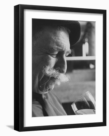 Wine Taster Sniffing Wine Before Tasting It-Carlo Bavagnoli-Framed Photographic Print