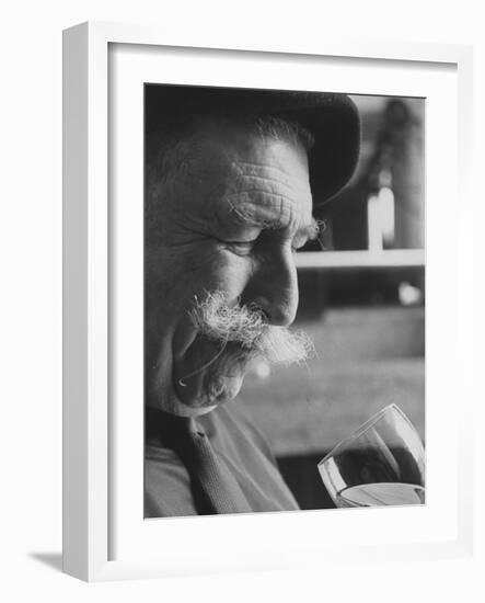 Wine Taster Sniffing Wine Before Tasting It-Carlo Bavagnoli-Framed Photographic Print