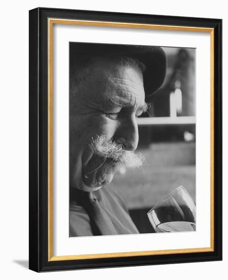 Wine Taster Sniffing Wine Before Tasting It-Carlo Bavagnoli-Framed Photographic Print