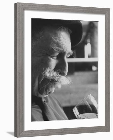 Wine Taster Sniffing Wine Before Tasting It-Carlo Bavagnoli-Framed Photographic Print