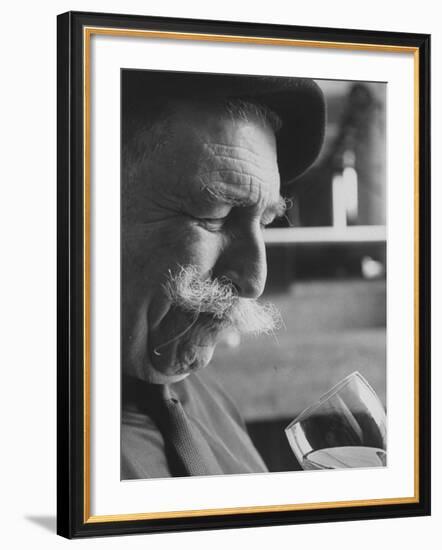 Wine Taster Sniffing Wine Before Tasting It-Carlo Bavagnoli-Framed Photographic Print