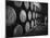 Winery Worker Checking Barrels of Wine-null-Mounted Photographic Print