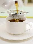Pouring Tea Through a Tea Strainer-Winfried Heinze-Photographic Print