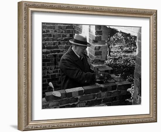 Winston Churchill Building a Brick Doll House for His Youngest Daughter-null-Framed Photographic Print