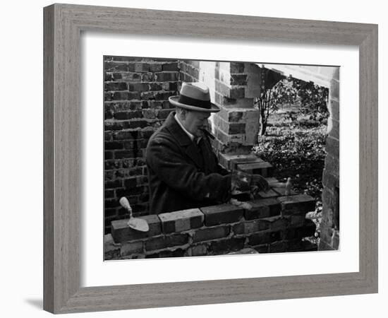 Winston Churchill Building a Brick Doll House for His Youngest Daughter-null-Framed Photographic Print