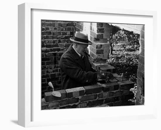 Winston Churchill Building a Brick Doll House for His Youngest Daughter-null-Framed Photographic Print