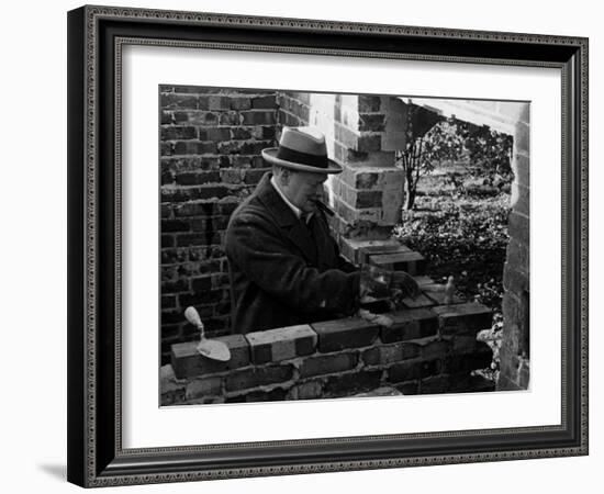 Winston Churchill Building a Brick Doll House for His Youngest Daughter-null-Framed Photographic Print