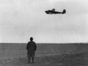 Winston Churchill, Photographed from Behind, Watching B-17 'Flying Fortress' in Flight, July 1940