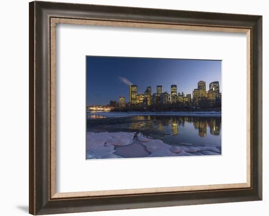 Winter city skyline reflects in the Bow River in Calgary, Alberta, Canada-Chuck Haney-Framed Photographic Print