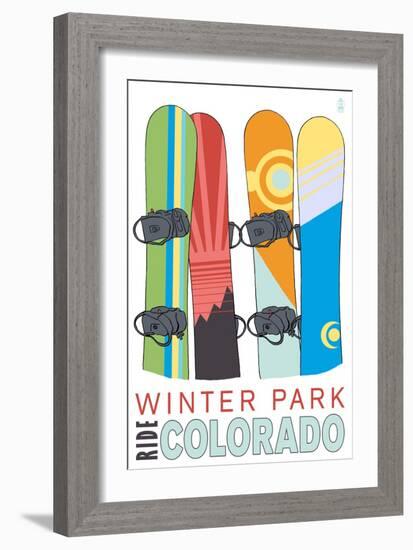 Winter Park, Colorado - Snowboards in Snow-Lantern Press-Framed Art Print