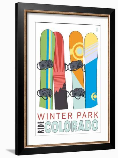 Winter Park, Colorado - Snowboards in Snow-Lantern Press-Framed Art Print