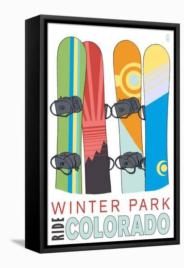 Winter Park, Colorado - Snowboards in Snow-Lantern Press-Framed Stretched Canvas