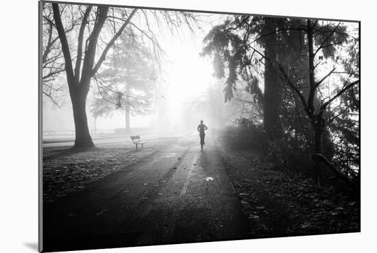 Winter Scene with Male Figure Jogging in Park-Sharon Wish-Mounted Photographic Print