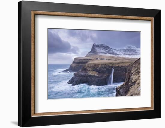 Wintry conditions at Gasadalur on the island of Vagar, Faroe Islands, Denmark, Europe. Winter (Marc-Adam Burton-Framed Photographic Print