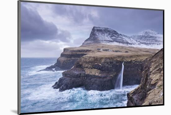 Wintry conditions at Gasadalur on the island of Vagar, Faroe Islands, Denmark, Europe. Winter (Marc-Adam Burton-Mounted Photographic Print