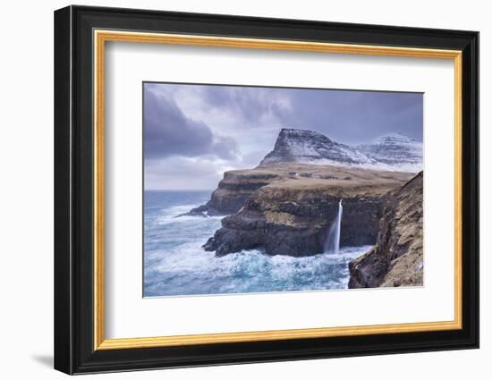 Wintry conditions at Gasadalur on the island of Vagar, Faroe Islands, Denmark, Europe. Winter (Marc-Adam Burton-Framed Photographic Print