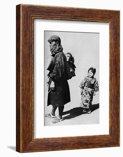''With his drum and monkey he is Japan's equivalent to our old-style organ grinder', c1900, (1921)-Julian Leonard Street-Framed Photographic Print