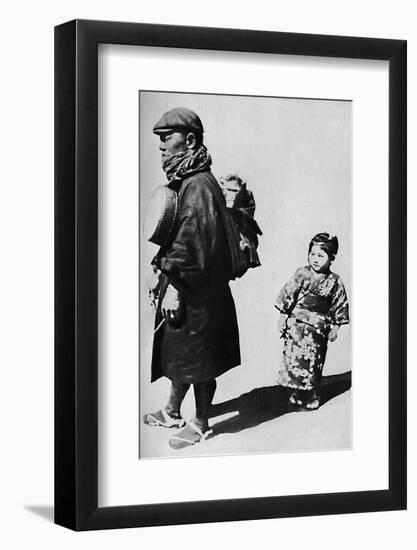 ''With his drum and monkey he is Japan's equivalent to our old-style organ grinder', c1900, (1921)-Julian Leonard Street-Framed Photographic Print