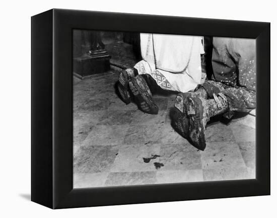 With Soiled Army Boots, a Chaplain and Soldier Kneel at Catholic Mass Is Held for Two Dead Soldiers-null-Framed Stretched Canvas