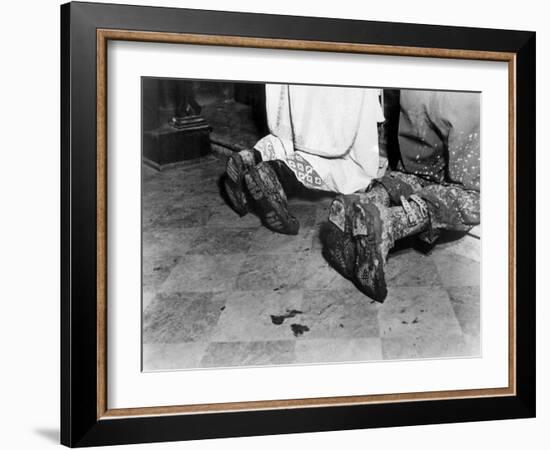 With Soiled Army Boots, a Chaplain and Soldier Kneel at Catholic Mass Is Held for Two Dead Soldiers-null-Framed Photo