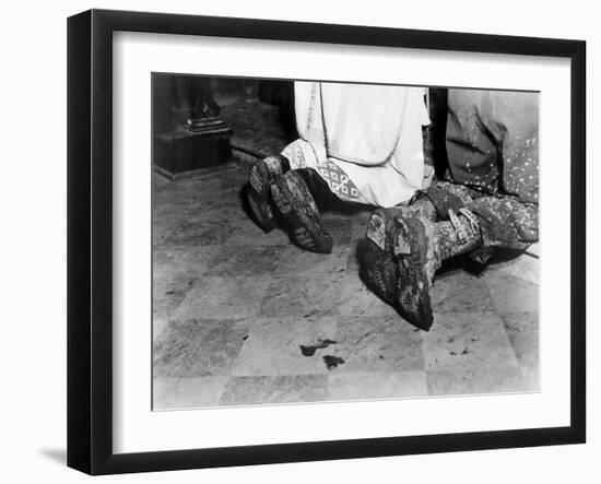 With Soiled Army Boots, a Chaplain and Soldier Kneel at Catholic Mass Is Held for Two Dead Soldiers-null-Framed Photo