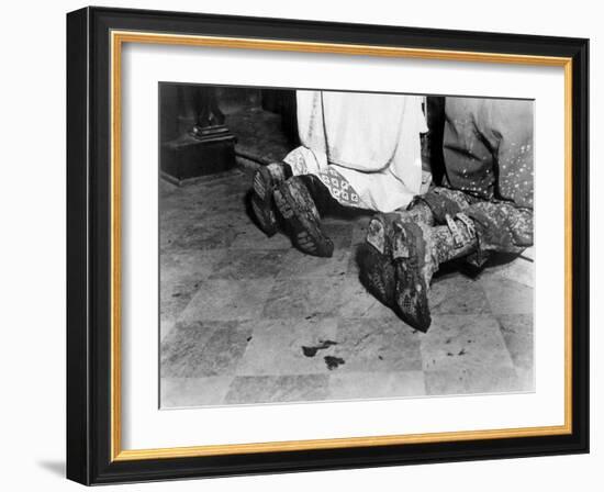 With Soiled Army Boots, a Chaplain and Soldier Kneel at Catholic Mass Is Held for Two Dead Soldiers-null-Framed Photo