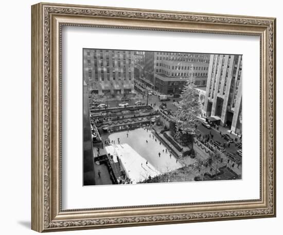 With the Famed Rockefeller Center Christmas Tree Rising Above Them, Skaters Glide on the Ice-null-Framed Photographic Print