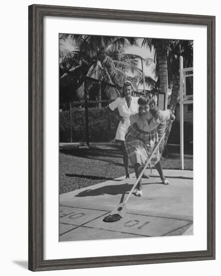 Wives of Men in the US Army and Navy Playing Shuffleboard-Peter Stackpole-Framed Photographic Print