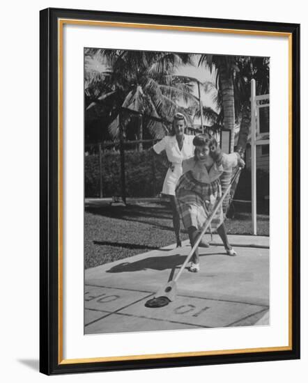 Wives of Men in the US Army and Navy Playing Shuffleboard-Peter Stackpole-Framed Photographic Print