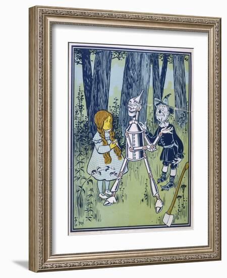 Wizard of Oz: Dorothy Oils the Tin Woodman's Joints-W.w. Denslow-Framed Photographic Print