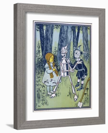 Wizard of Oz: Dorothy Oils the Tin Woodman's Joints-W.w. Denslow-Framed Photographic Print