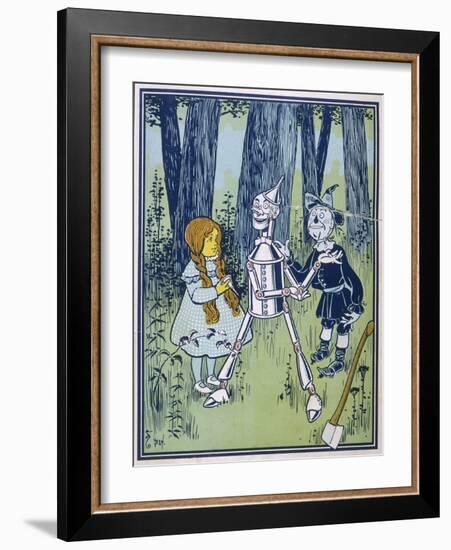 Wizard of Oz: Dorothy Oils the Tin Woodman's Joints-W.w. Denslow-Framed Photographic Print