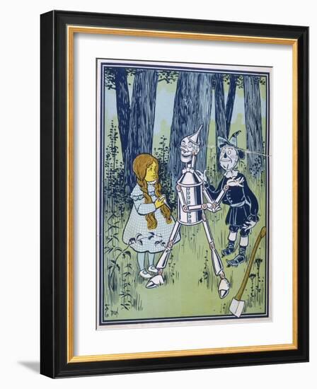 Wizard of Oz: Dorothy Oils the Tin Woodman's Joints-W.w. Denslow-Framed Photographic Print