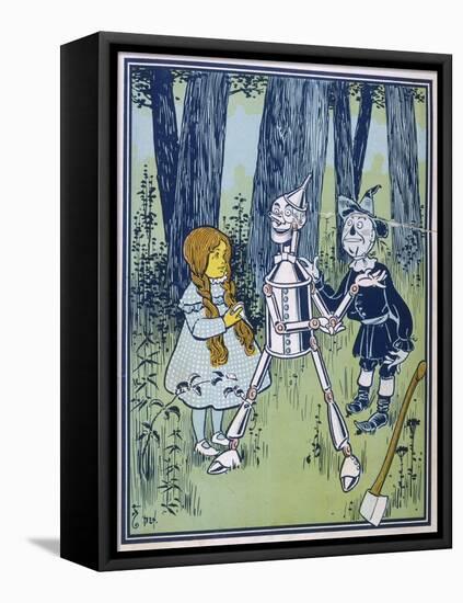 Wizard of Oz: Dorothy Oils the Tin Woodman's Joints-W.w. Denslow-Framed Premier Image Canvas