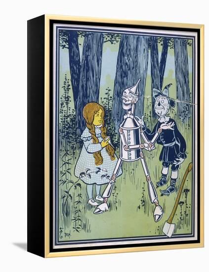 Wizard of Oz: Dorothy Oils the Tin Woodman's Joints-W.w. Denslow-Framed Premier Image Canvas