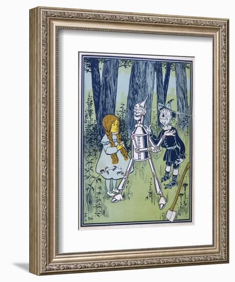 Wizard of Oz: Dorothy Oils the Tin Woodman's Joints-W.w. Denslow-Framed Photographic Print