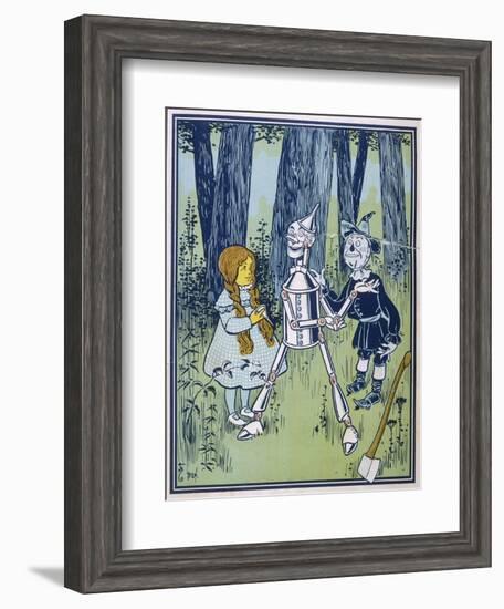 Wizard of Oz: Dorothy Oils the Tin Woodman's Joints-W.w. Denslow-Framed Photographic Print