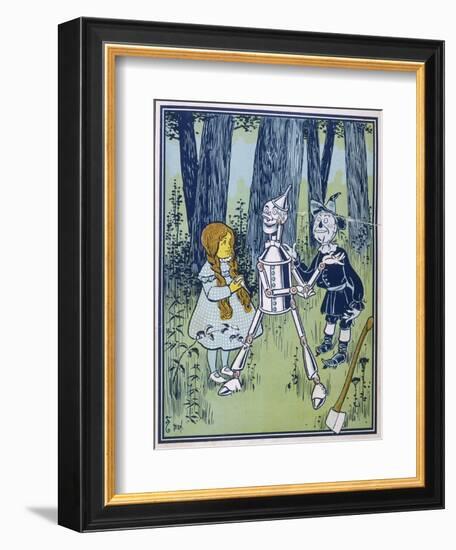 Wizard of Oz: Dorothy Oils the Tin Woodman's Joints-W.w. Denslow-Framed Photographic Print